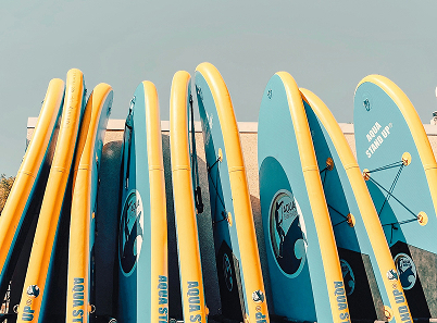 paddleboards standing upright